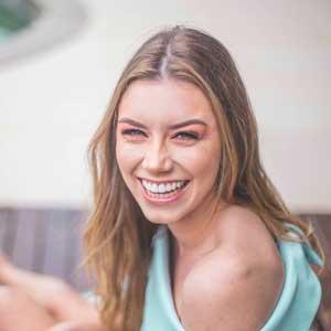 Girl Smiling Blonde Wearing Teal Clothes